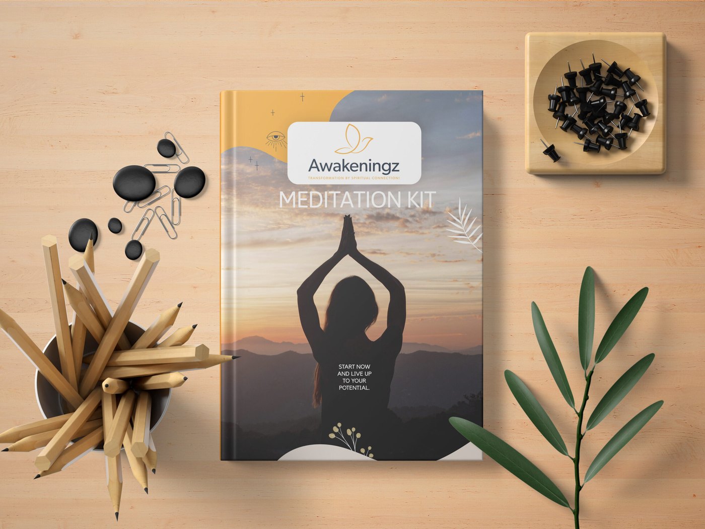 Awakeningz Meditation Kit guide on a wooden desk